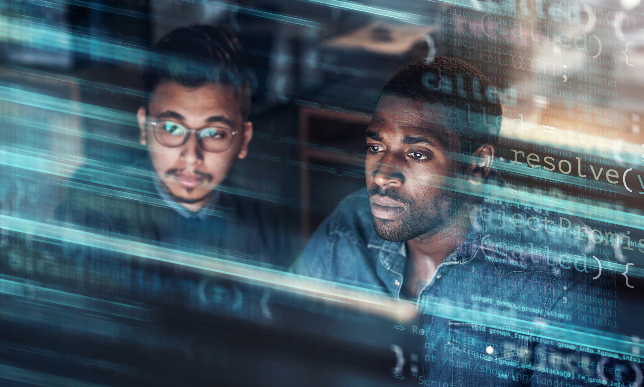Two developers intently studying code reflected on a glass screen in a dark cinematic environment